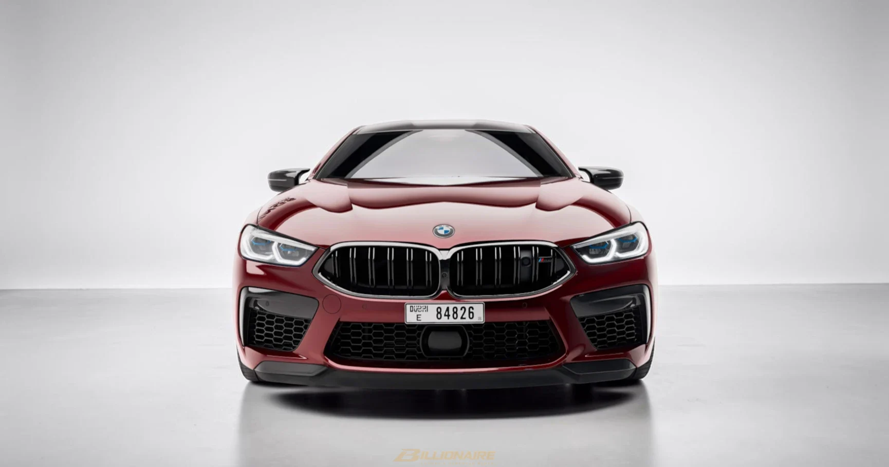 BMW M8 Competition Coupe — Motegi Red - View 3