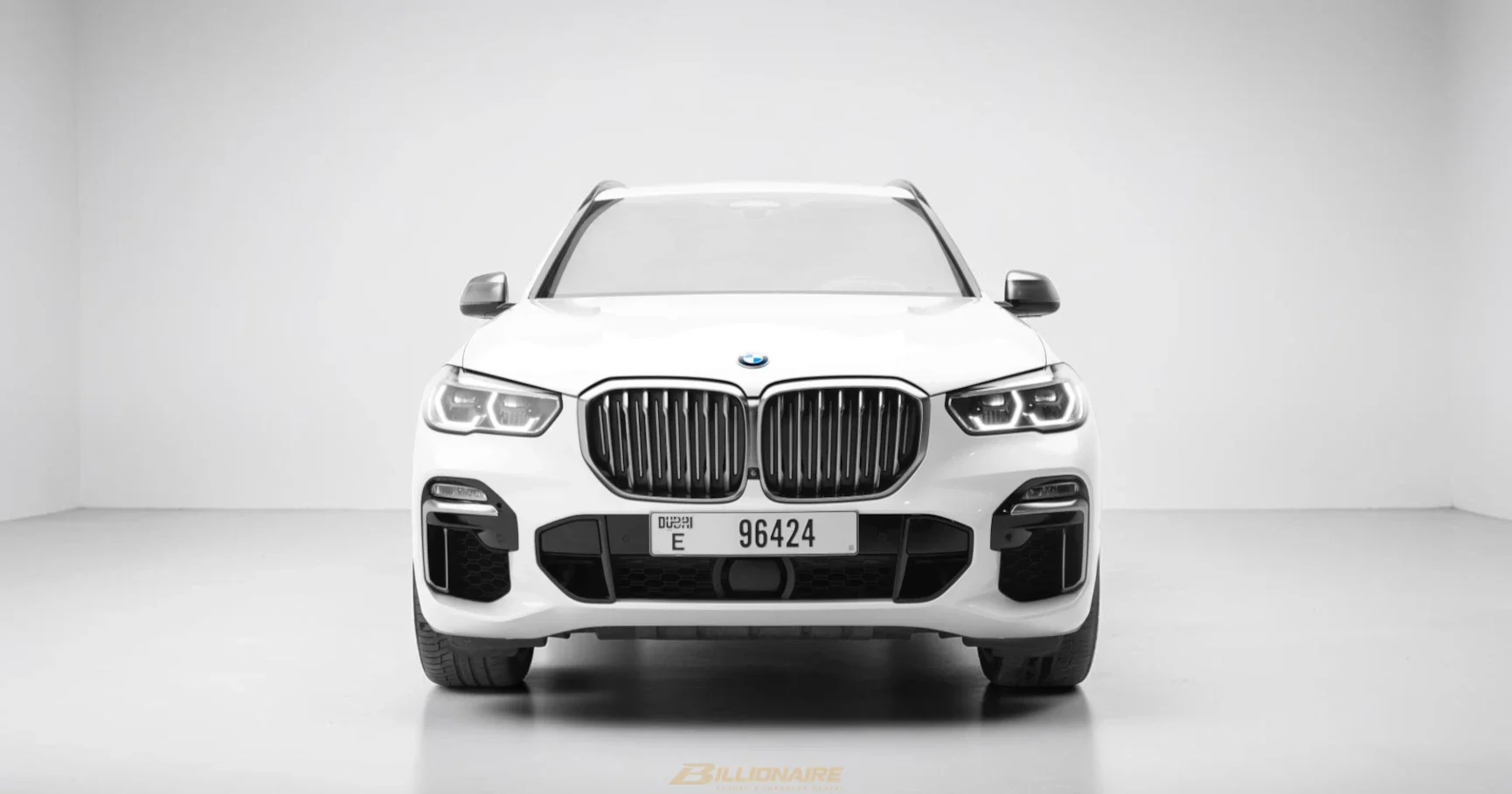 BMW X5 M50i — Mineral White - View 2